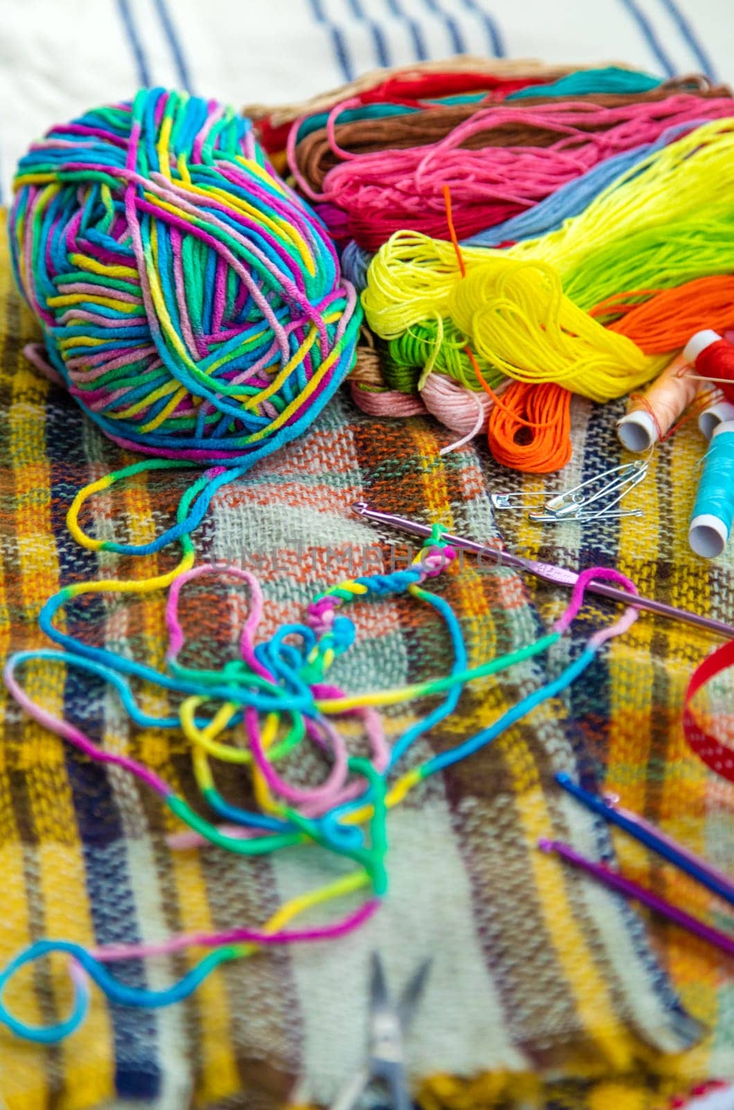 Threads and accessories for sewing and knitting. Selective focus. by yanadjana