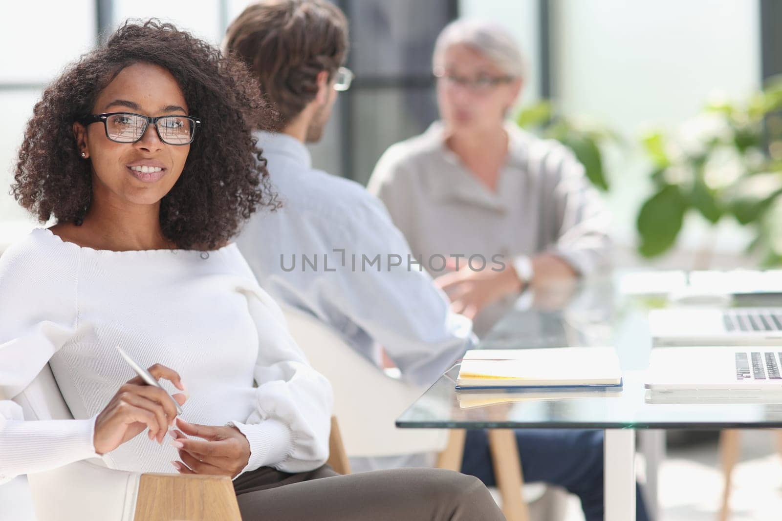 young attractive african american woman in the office by Prosto