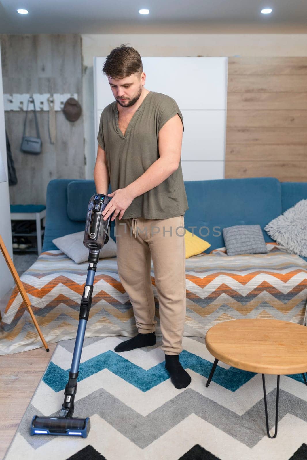 Man husband cleaning the house helping wife.