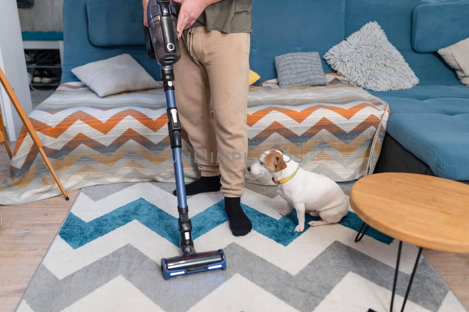 Man husband cleaning the house helping wife.