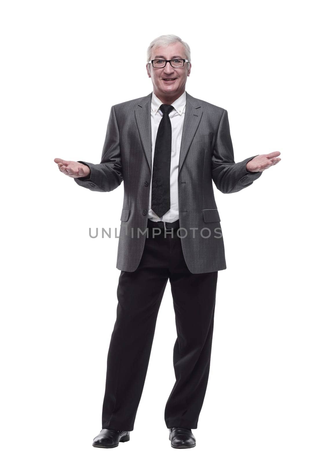 in full growth.Mature business man. isolated on a white background.