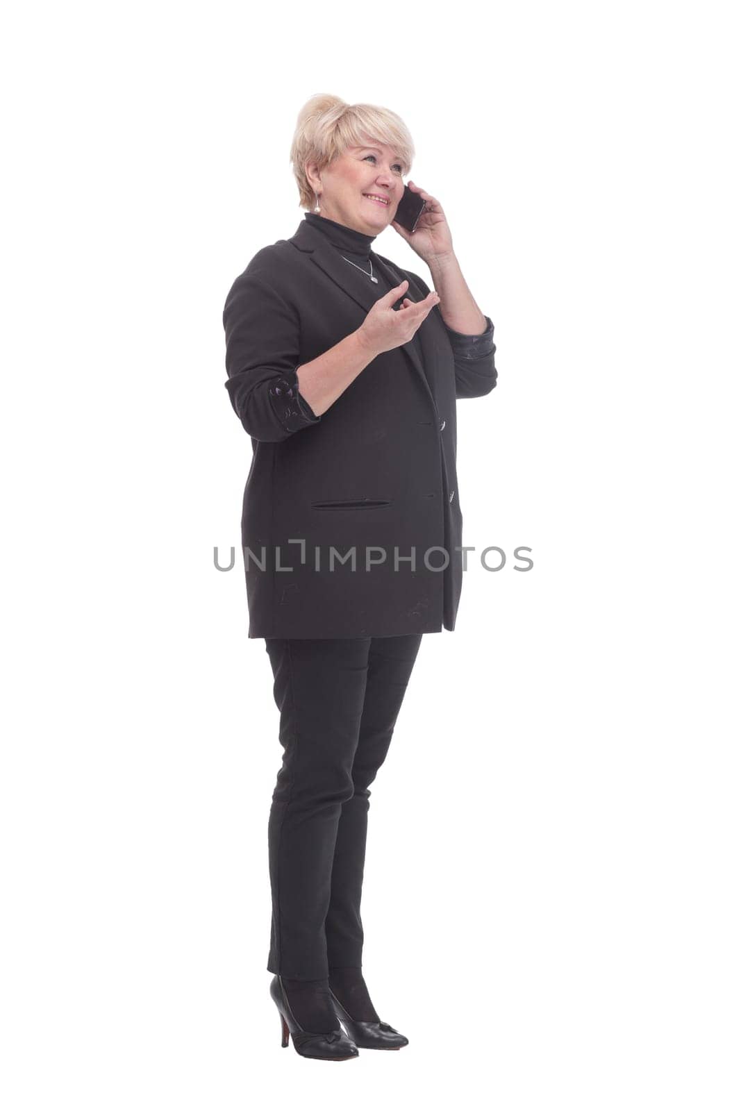 in full growth. business woman with a smartphone and takeaway coffee. isolated on a white background.