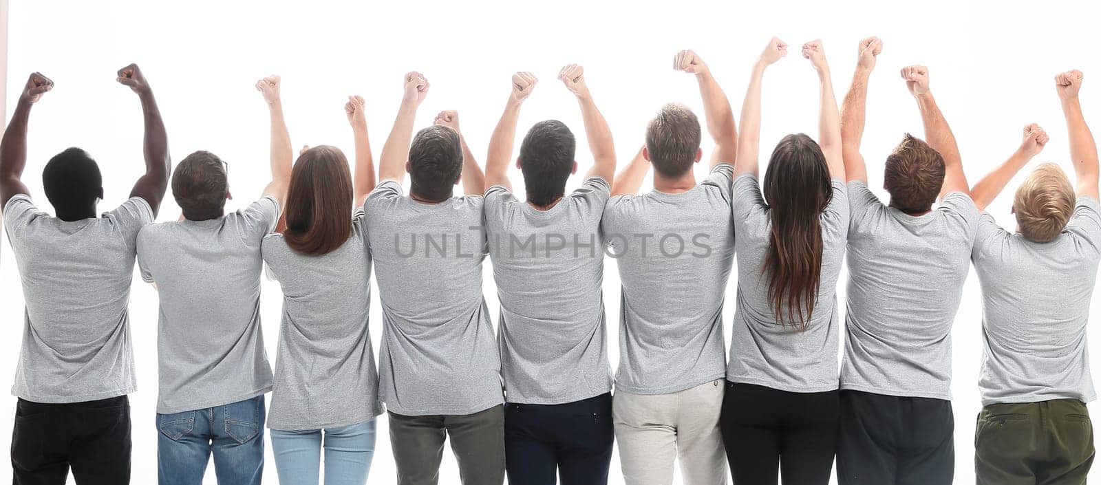 rear view. a group of young like-minded people holding their hands up. isolated on white