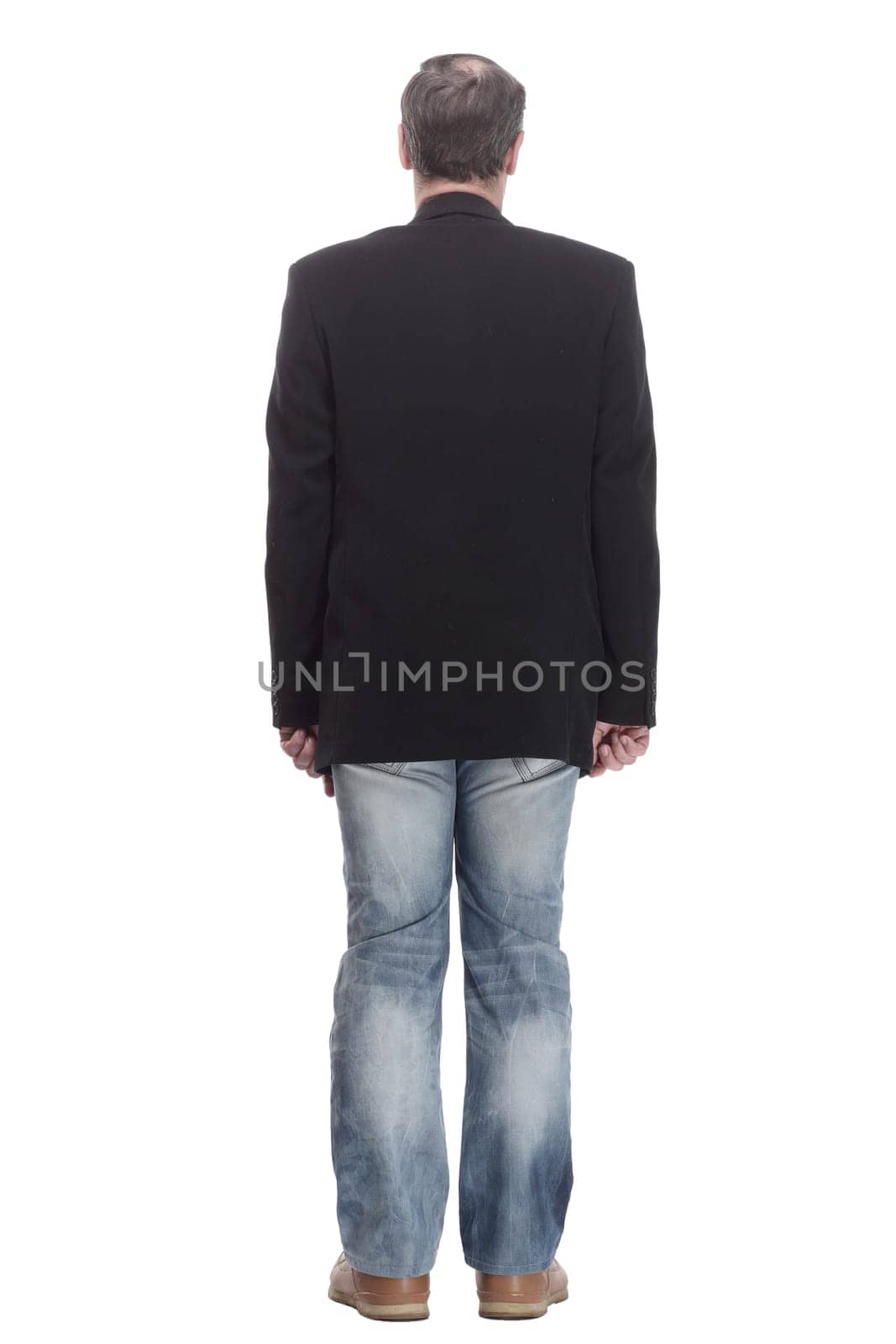 in full growth. casual business man in jeans and jacket. isolated on a white background.