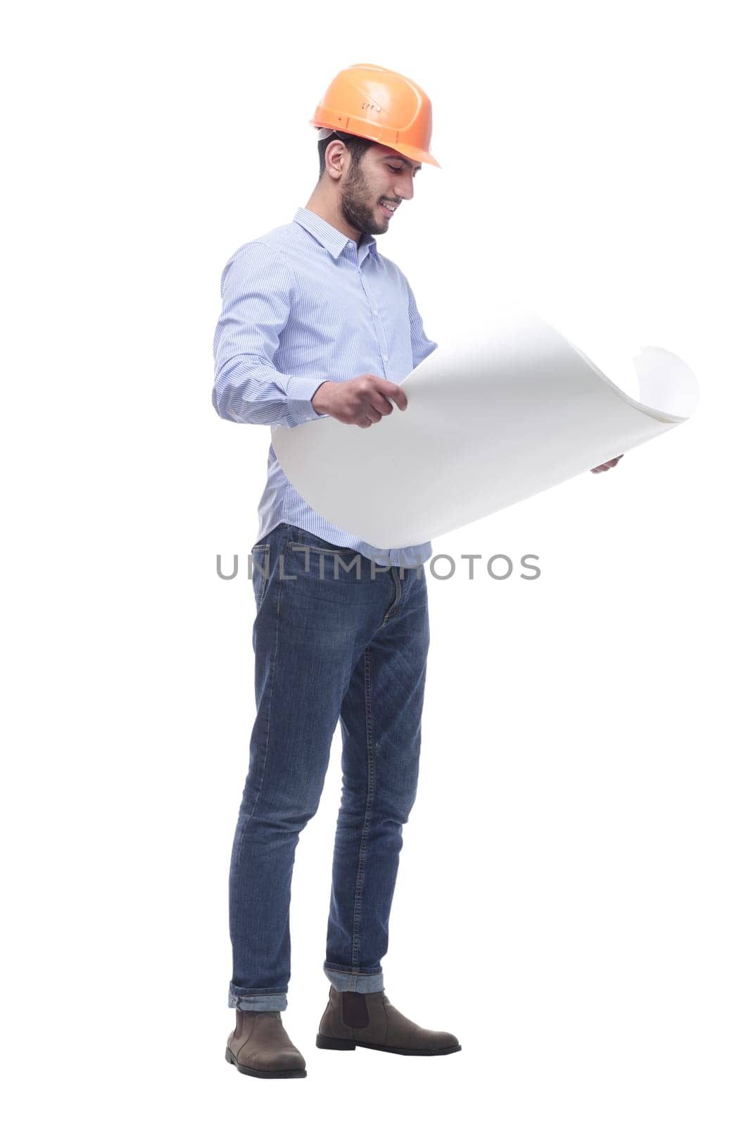 in full growth. male architect with a drawing of a new project . isolated on a white background.