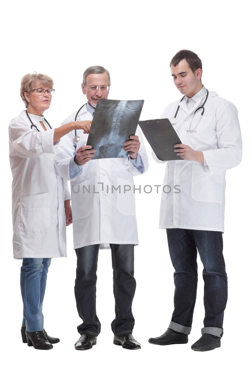 Portrait of group of smiling hospital colleagues standing together. Healthcare and medicine concept