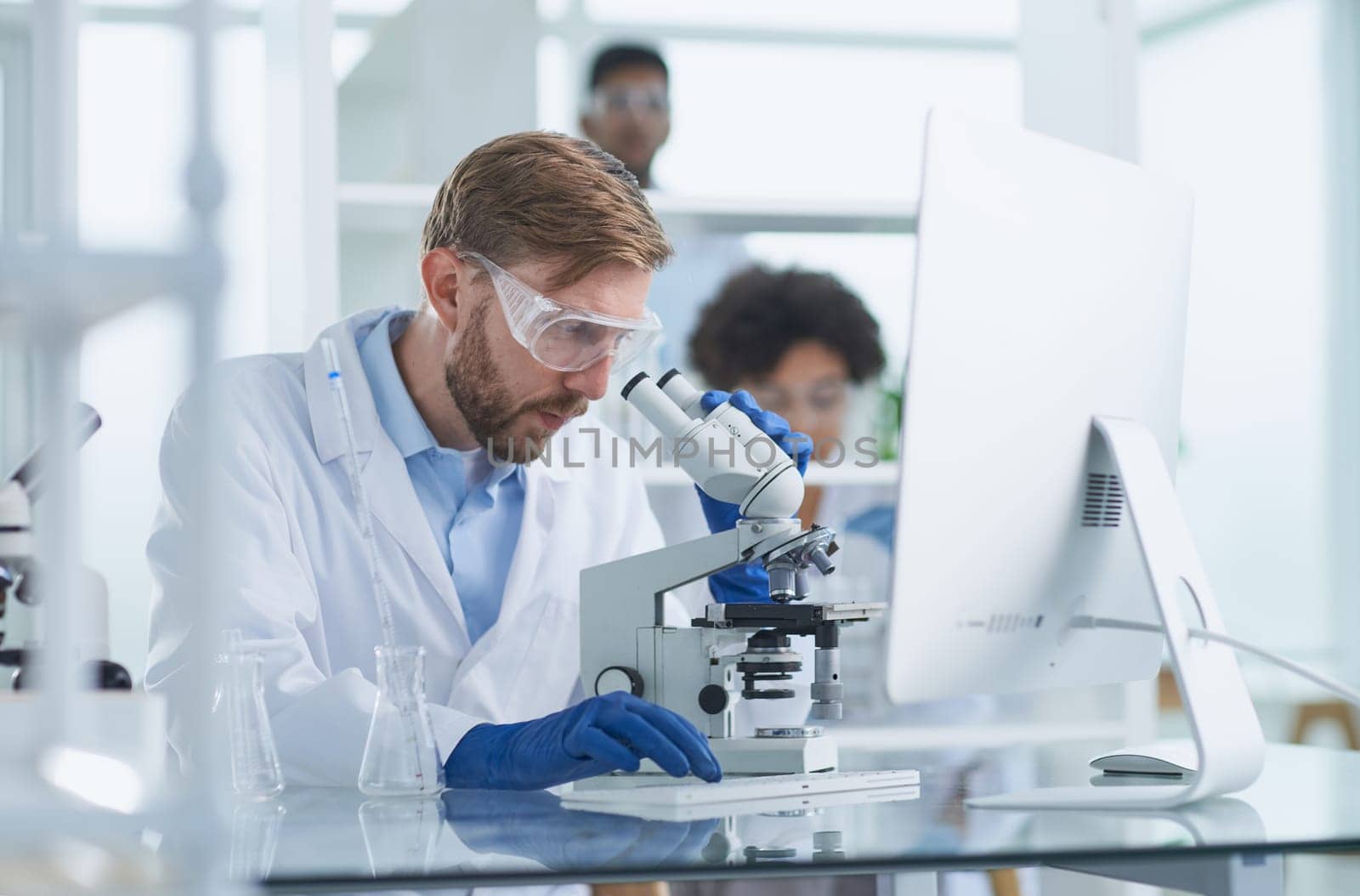 Focused male scientist working in laboratory