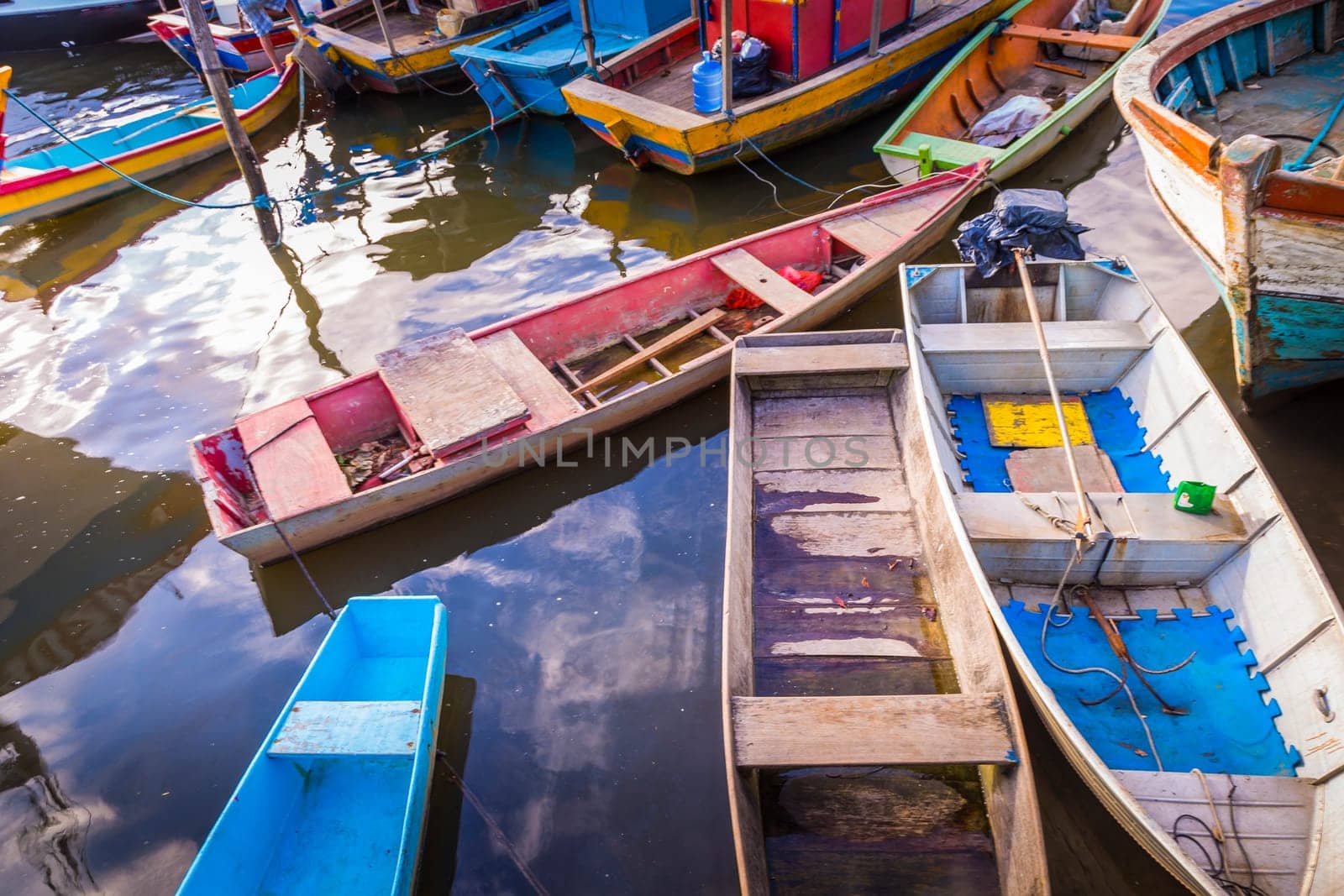 Idyllic Porto Seguro Beach at sunset with fishermen rustic wooden boats, BAHIA, Brazil