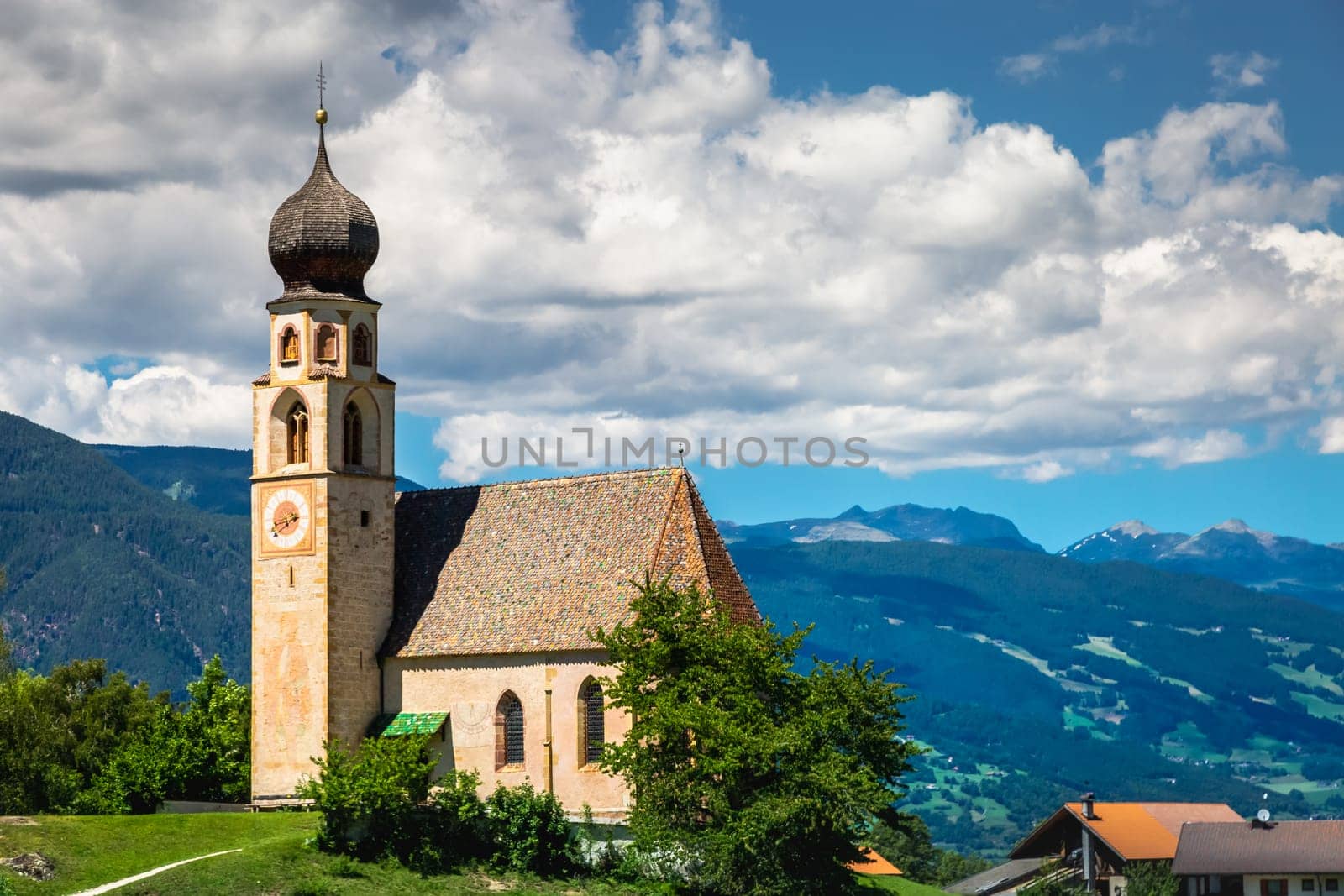 Church in Seiser alm and Val di Funes on the italian Dolomites at sunset, Italy