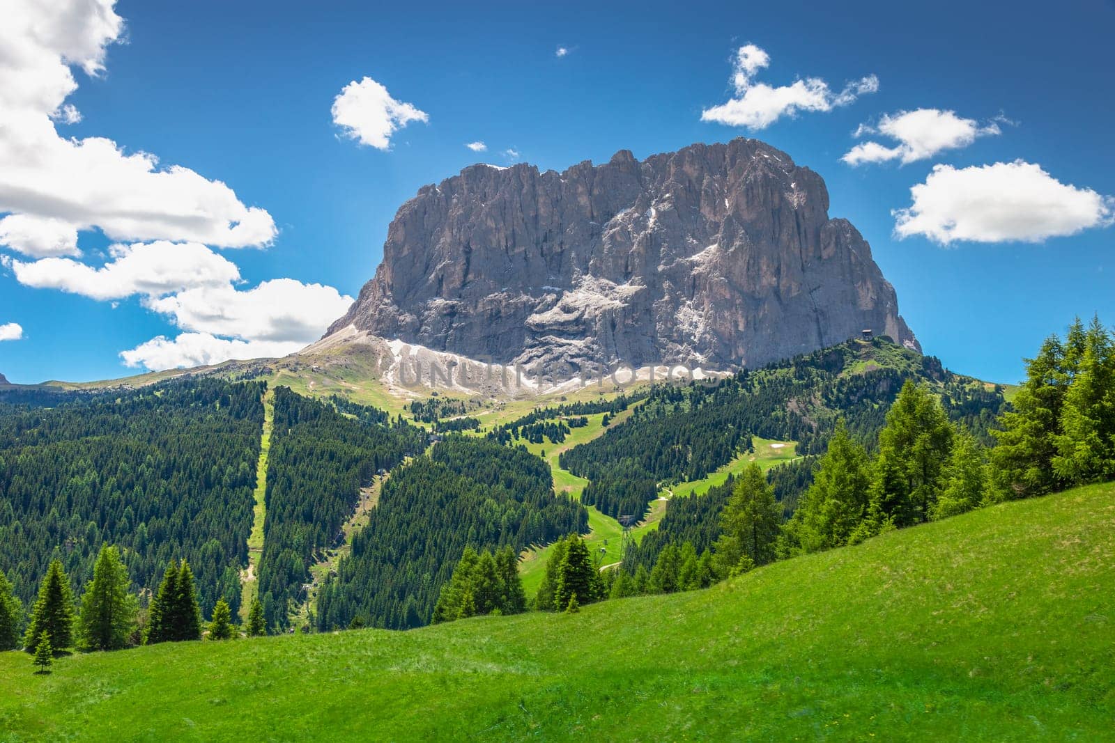 Idyllic landscape in Gardena pass valley and Sassolungo massif, italian Dolomites at springtime, Italy