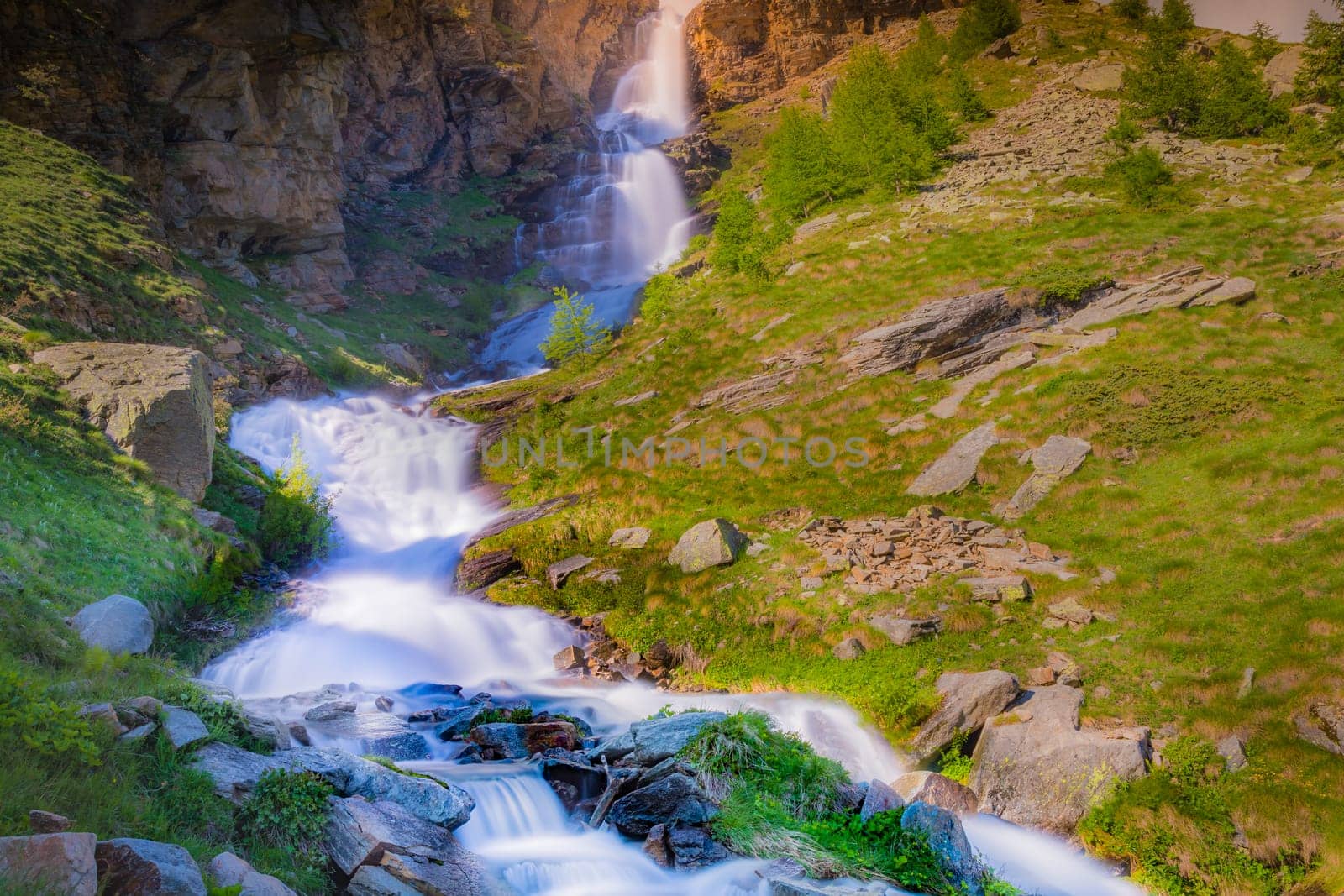 Waterfall in Gran Paradiso national park, Aosta Valley in the italian Alps, northern Italy