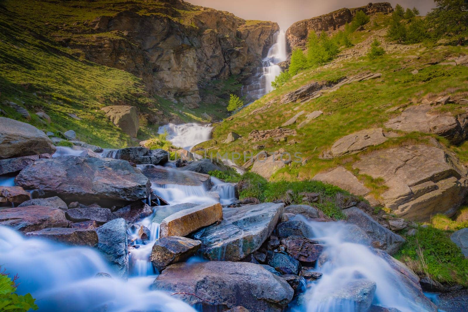 Waterfall in Gran Paradiso national park, Aosta Valley and italian Alps, Italy by positivetravelart