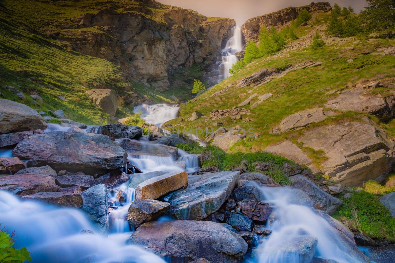 Waterfall in Gran Paradiso national park, Aosta Valley in the italian Alps, northern Italy