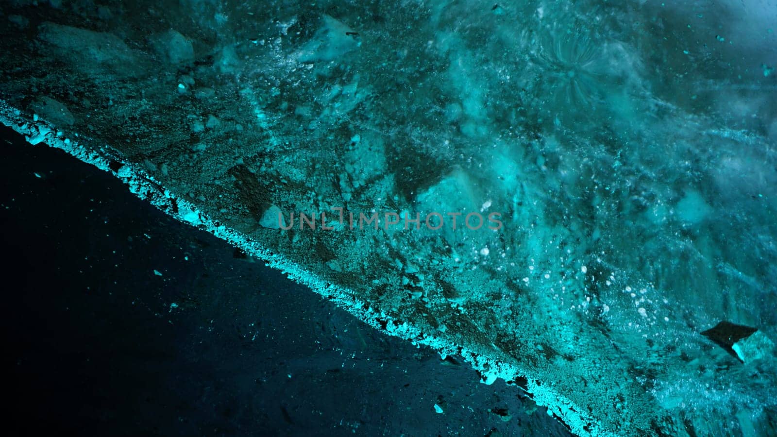 Turquoise pure color of ice inside the ice cave. by Passcal