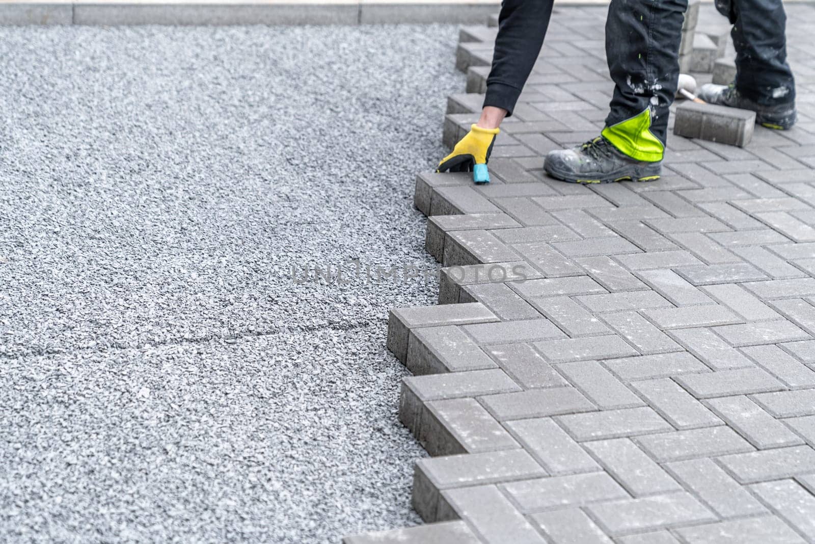 new sidewalk made of concrete interlocking paving blocks.