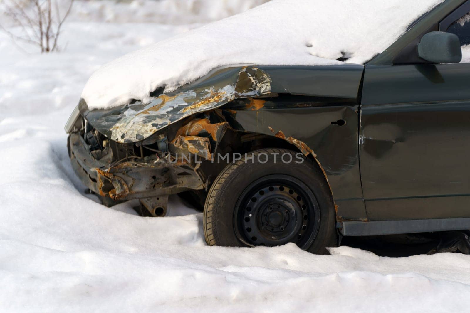 Car after an accident in winter, abandoned car after accident. Selective focus