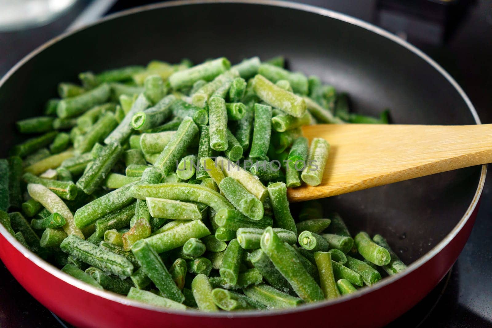 Preparation of frozen green beans. Cooking concept, cookbook, recipes