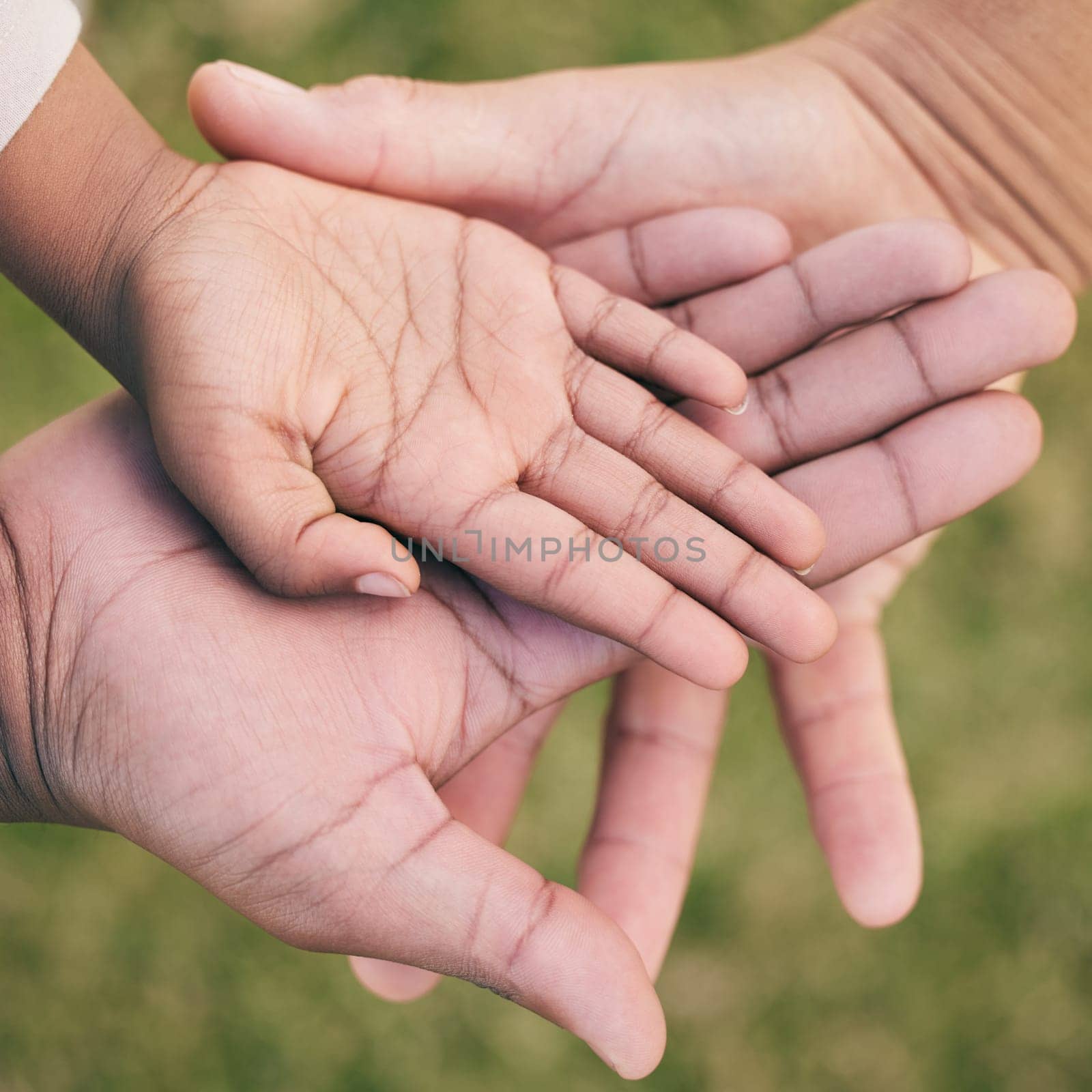 Hands palm close up, kid and parents for family, love or support in summer on vacation at park. Helping hand, solidarity and together with help, care or outdoor for quality time, bonding and stack.