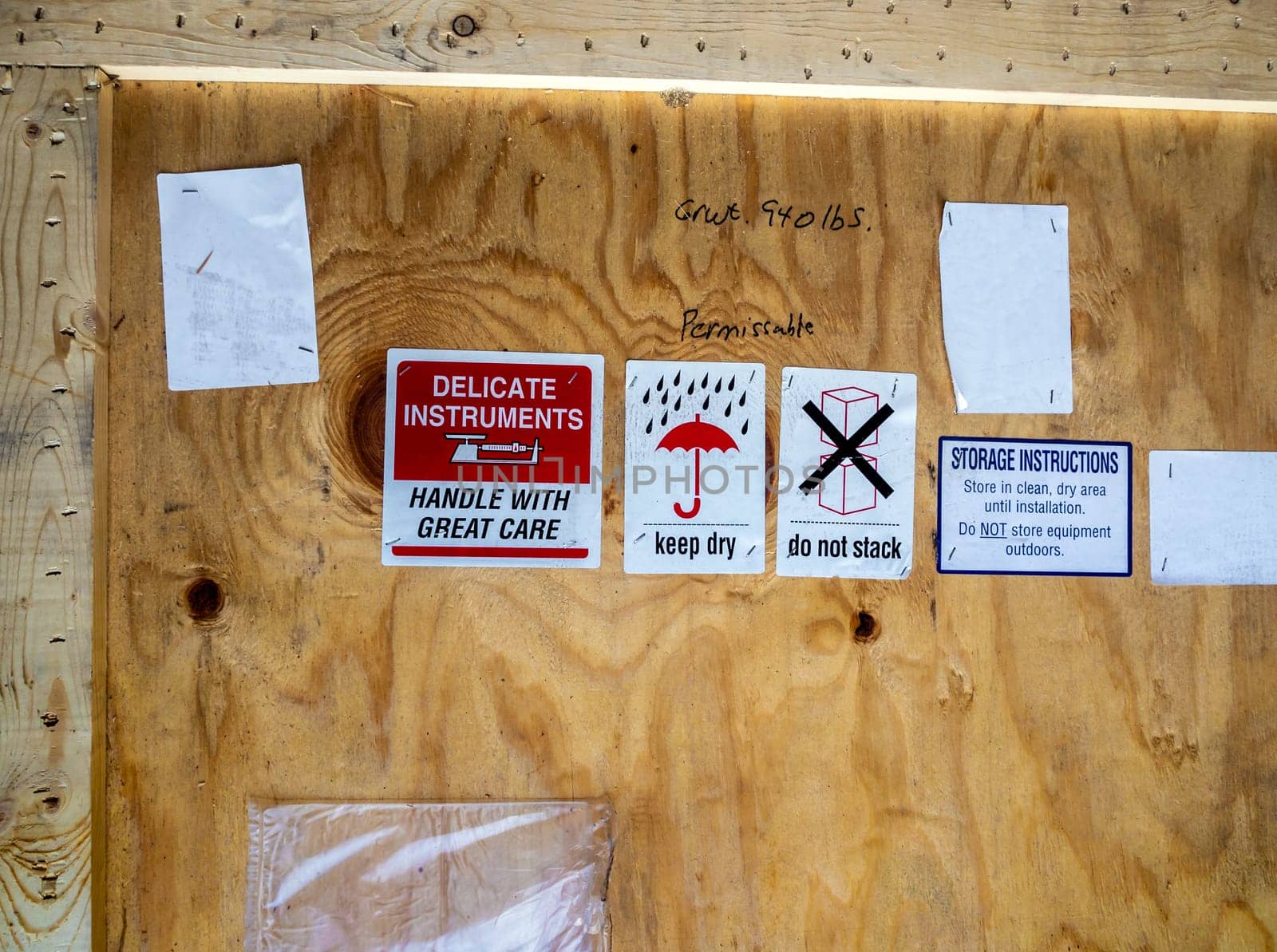 warning label beside transportation wooden box
