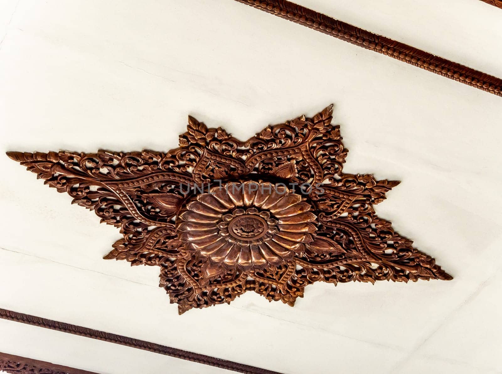 Beautiful art pattern decoration on the ceiling of the rooms in the temple by Satakorn