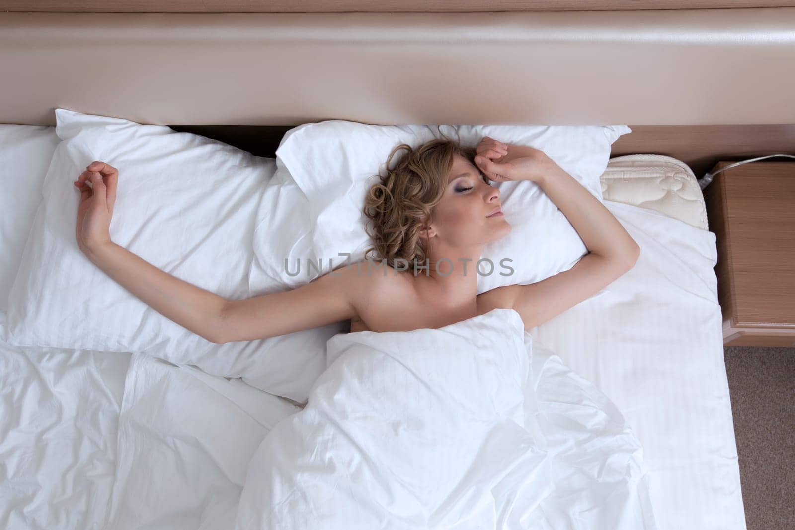 Beauty young woman relax bed in morning bedroom