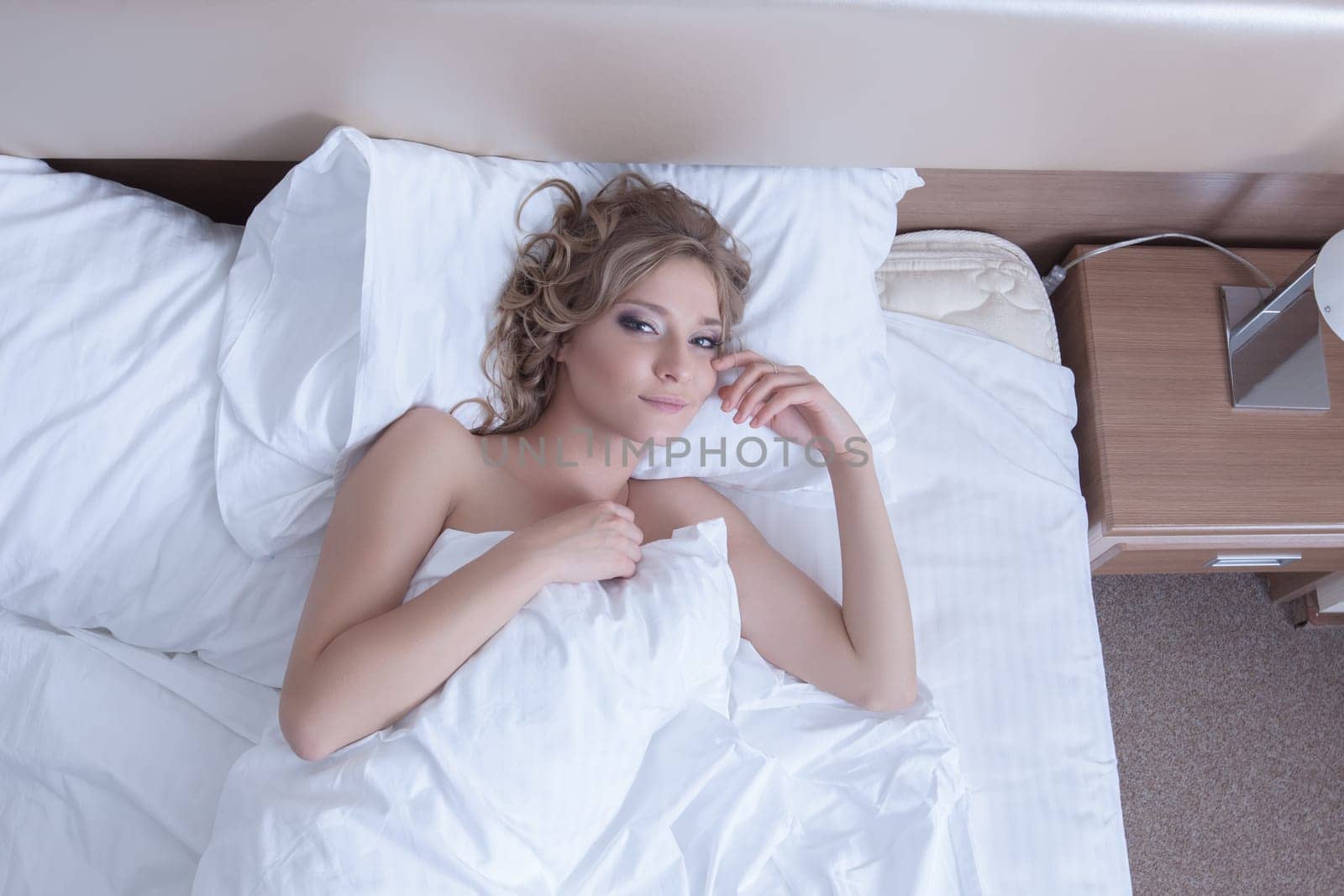 Beautiful woman wake up in morning bed