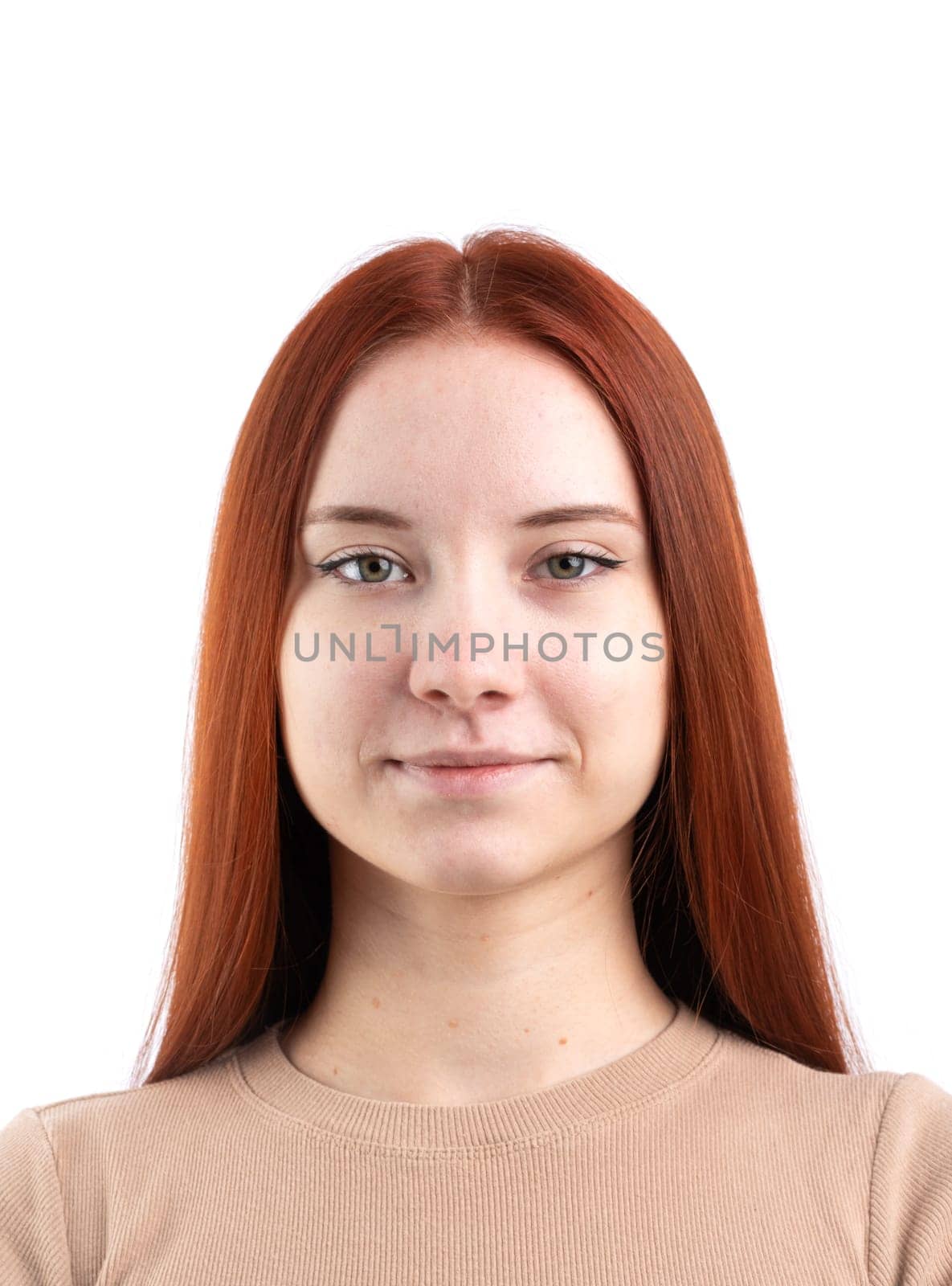 Passport photo of a real young woman with ginger red hair , isolated on white background. Document photo