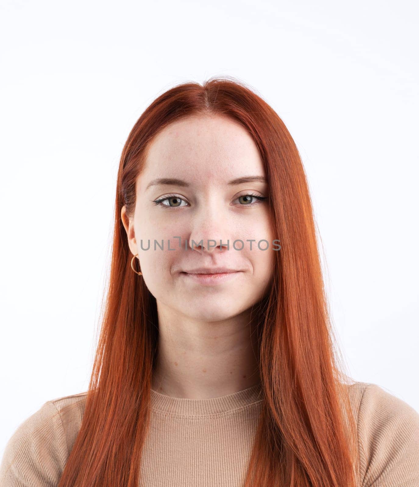 Passport photo of a real young woman with ginger red hair , isolated on white background. Document photo