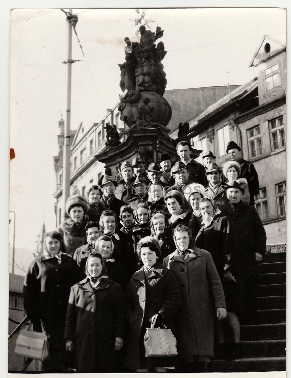 KARLOVY VARY, THE CZECHOSLOVAK SOCIALIST REPUBLIC - CIRCA 1970s: Retro photo shows people pose at the spa resort. Black and white vintage photography.