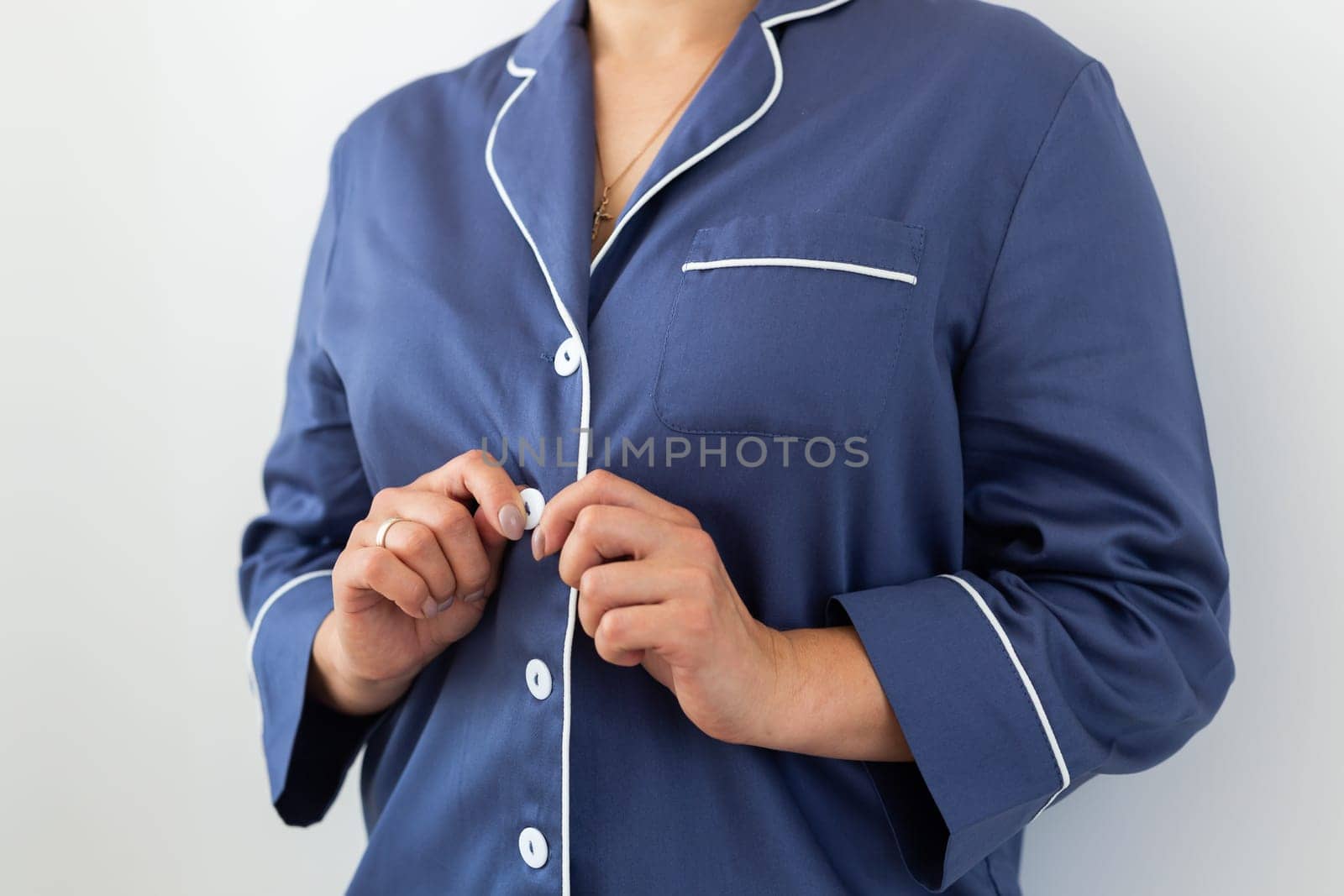 Close-up detail and fabric texture of a pajama. Homewear, sleepwear, shopping and sale.