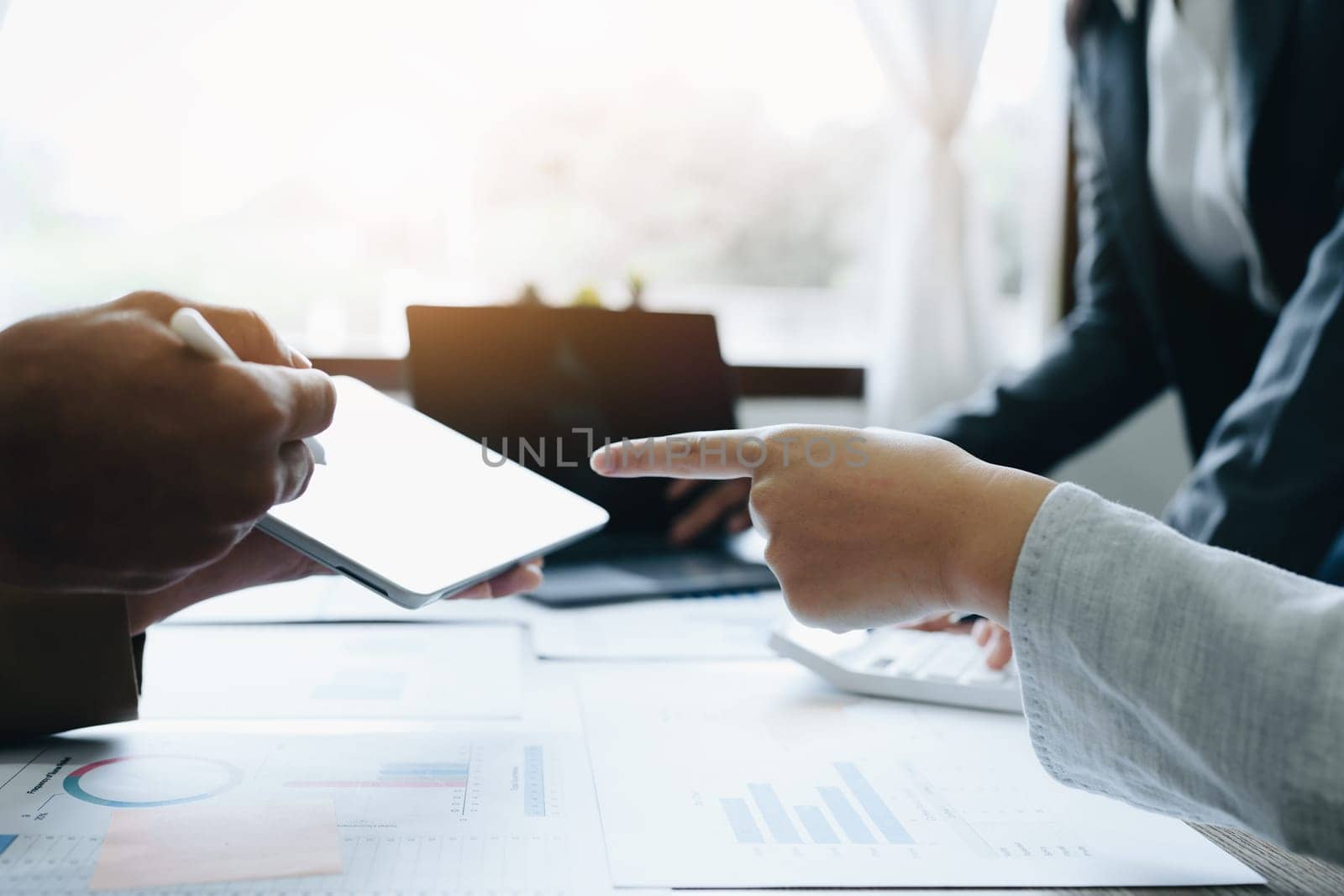 Asian entrepreneurs and business people meeting in a conference room in business planning, financial budget and investment risk assessment to analyze customer groups to increase company growth.