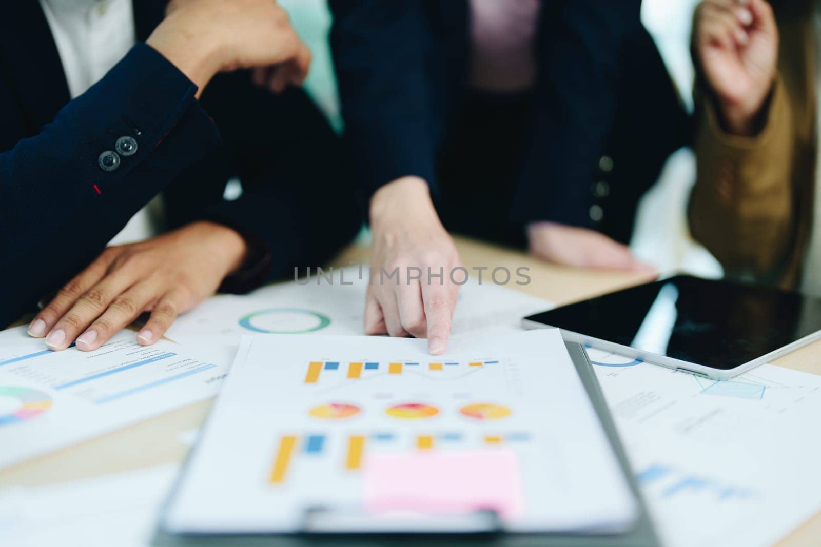 Asian entrepreneurs and business people meeting in a conference room in business planning, financial budget and investment risk assessment to analyze customer groups to increase company growth.