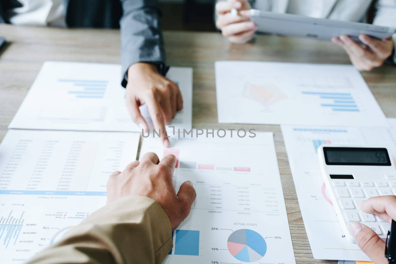 Asian entrepreneurs and business people meeting in a conference room in business planning, financial budget and investment risk assessment to analyze customer groups to increase company growth.