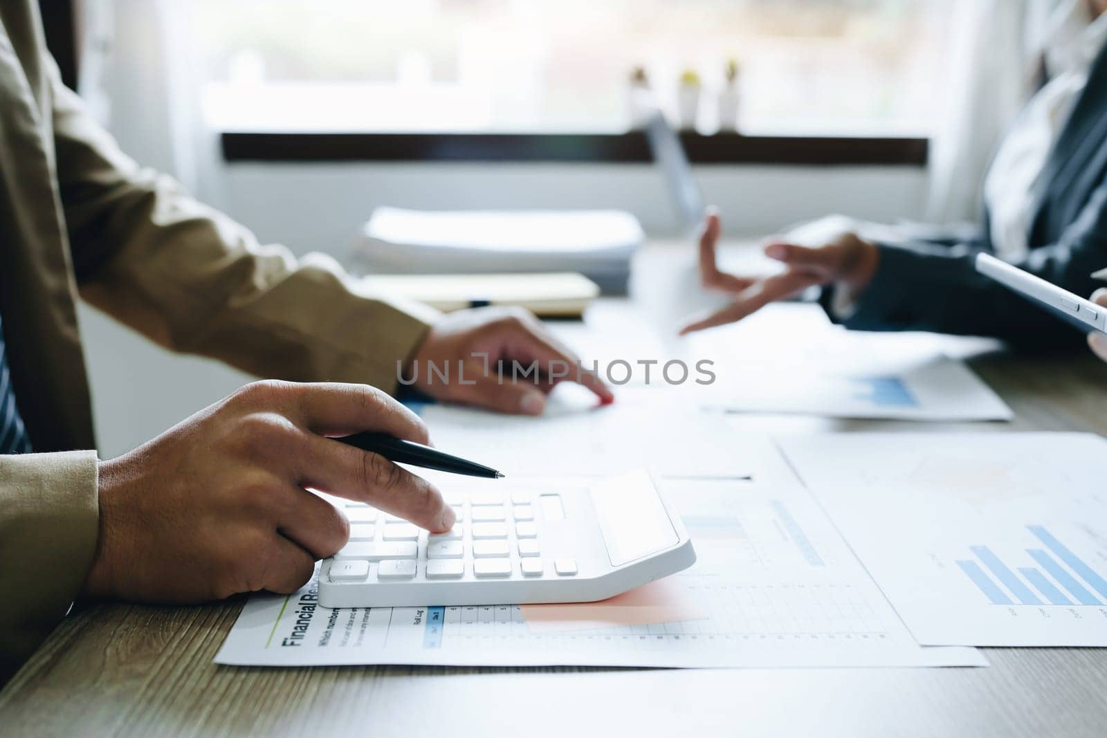 Asian entrepreneurs and business people meeting in a conference room in business planning, financial budget and investment risk assessment to analyze customer groups to increase company growth.