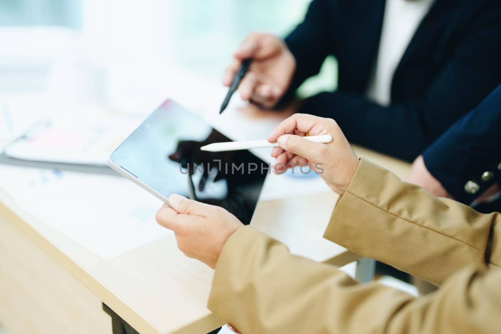 Asian entrepreneurs and business people meeting in a conference room in business planning, financial budget and investment risk assessment to analyze customer groups to increase company growth.