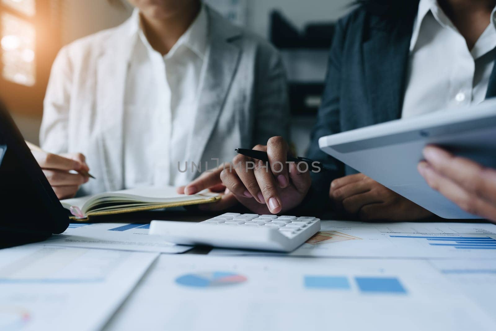 Asian entrepreneurs and business people meeting in a conference room in business planning, financial budget and investment risk assessment to analyze customer groups to increase company growth.