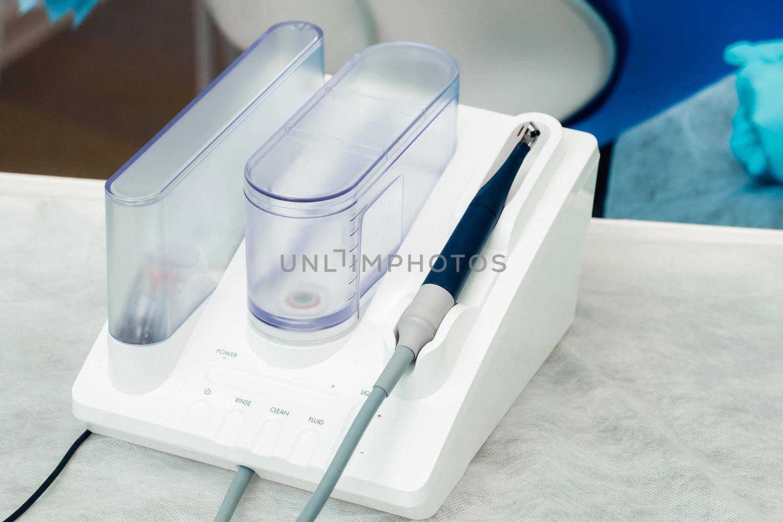 Ultrasonic scaler in the dental office. Dentistry Concept by Lobachad