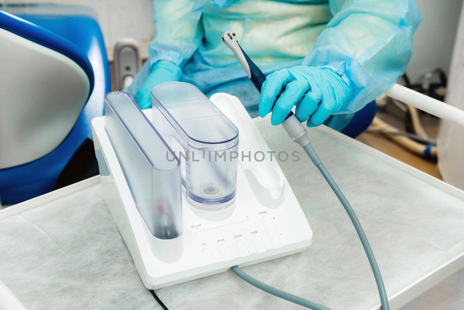 Ultrasonic scaler in the dental office. Dentistry Concept.