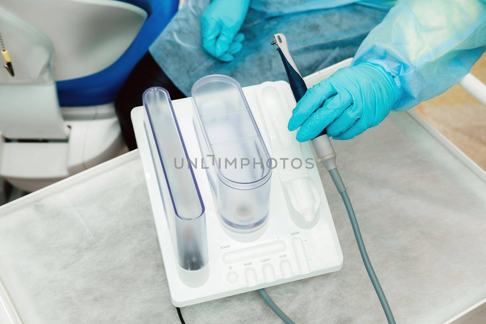 Ultrasonic scaler in the dental office. Dentistry Concept by Lobachad