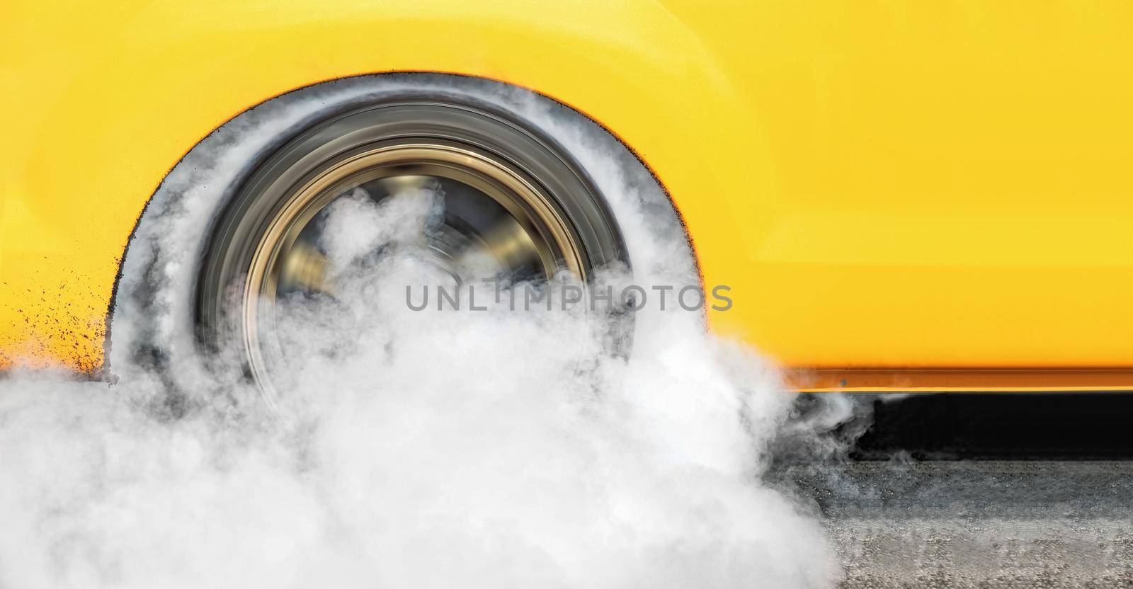 Drag racing car burns rubber off its tires in preparation for the race