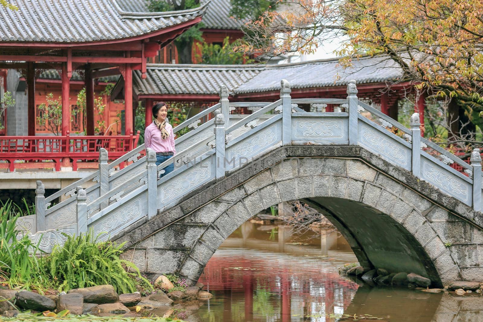 Traveler Tourist Woman at public park in oldtown of Dali ,Yunnan, China