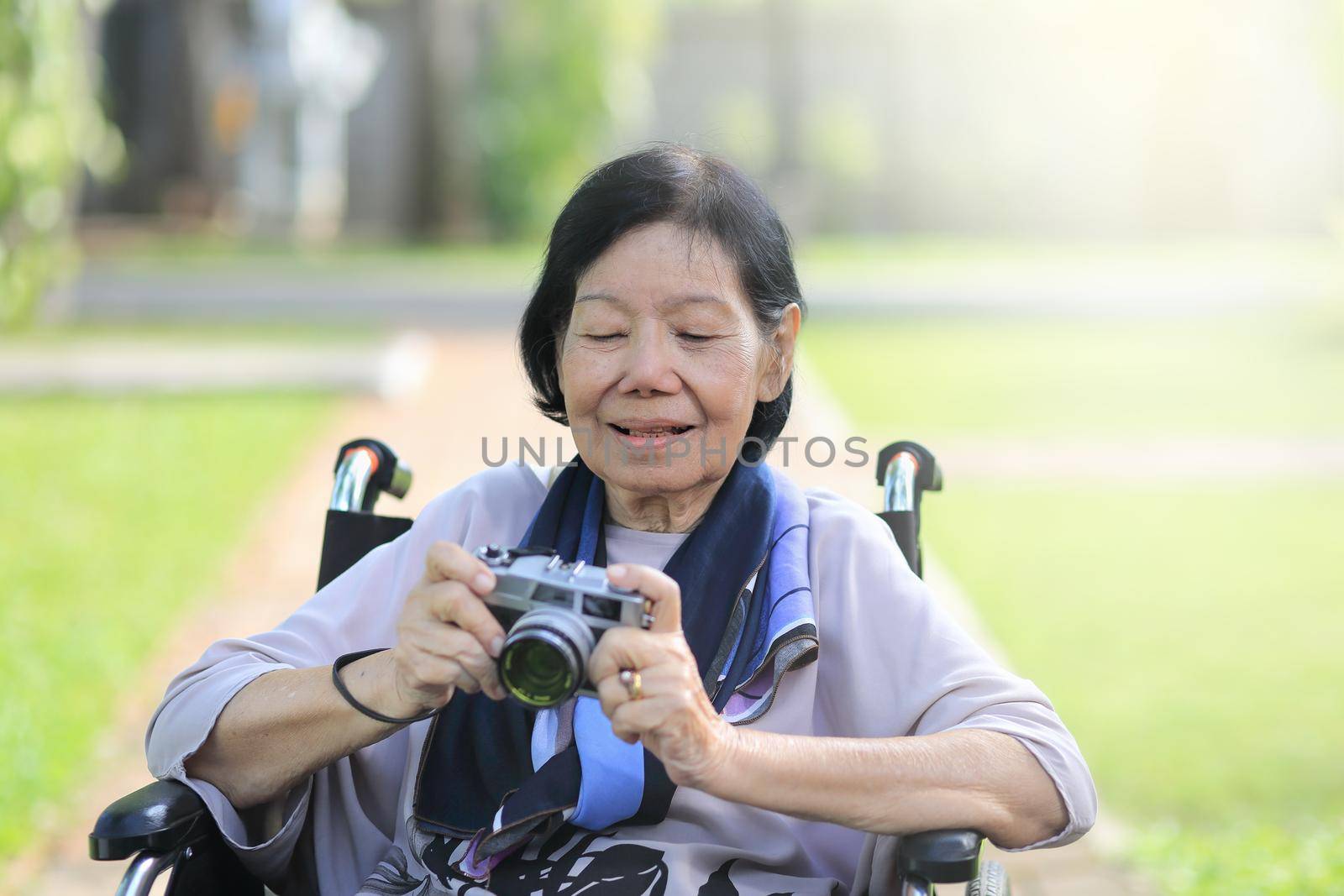elderly woman relax with hobby in backyard