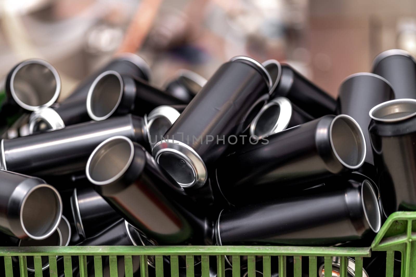 black aluminum drink cans in production. High quality photo