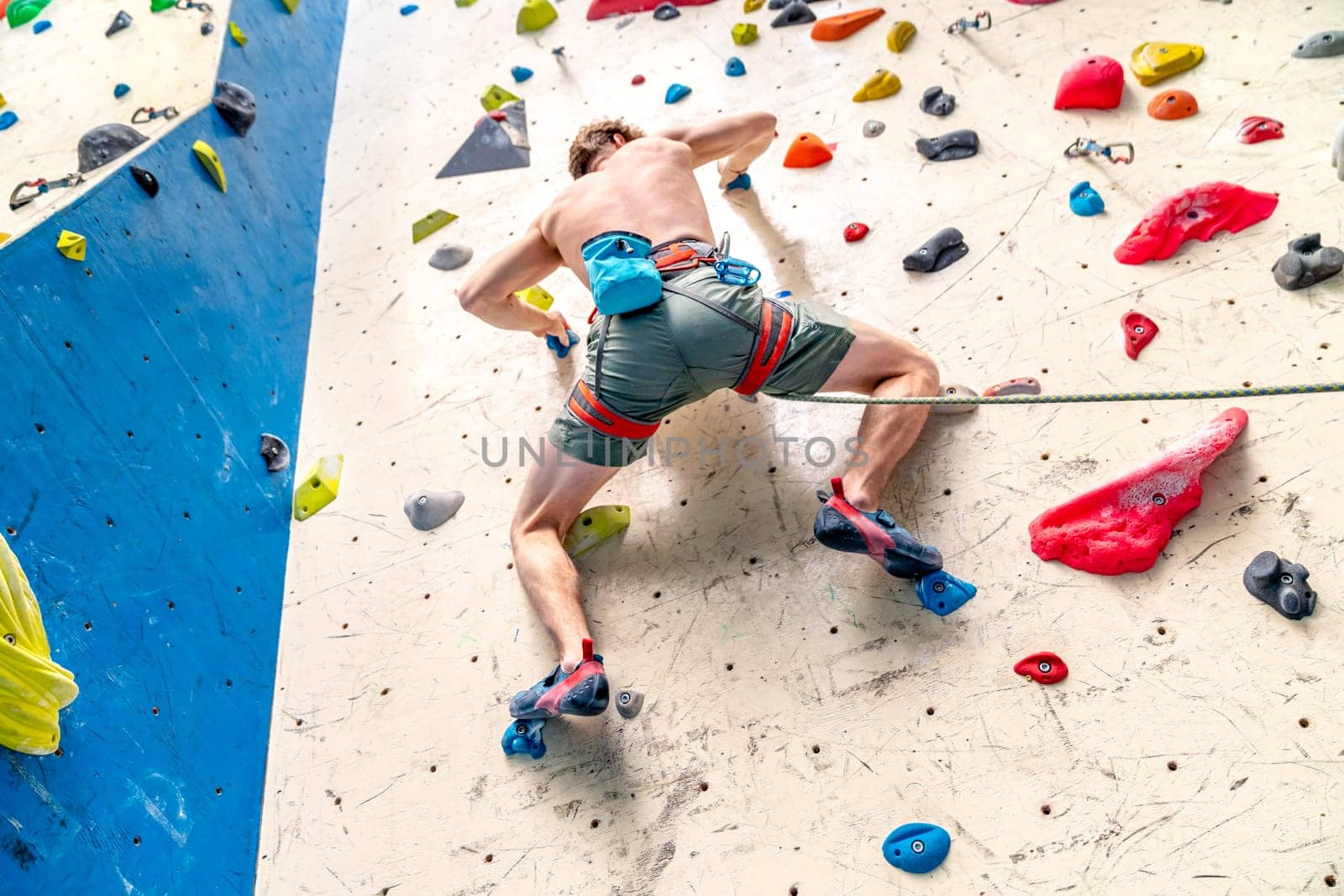 climbing artificial climbing walls with belay rope. High quality photo