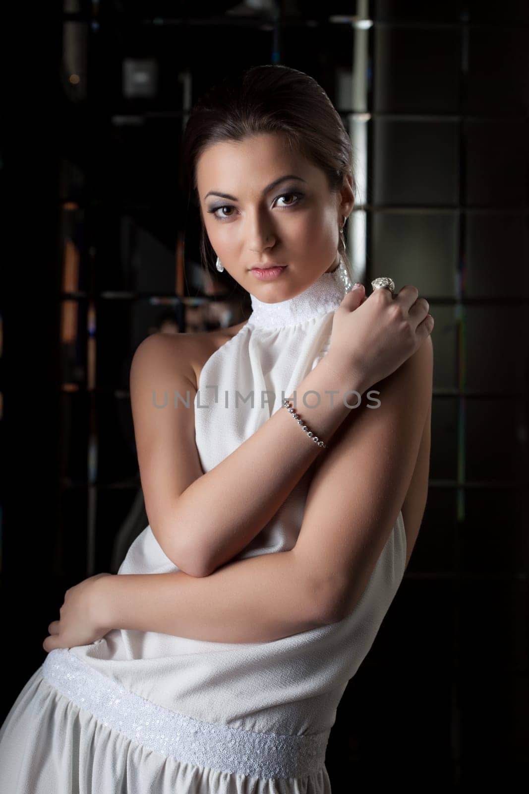 Portrait of brunette young woman in nightclub