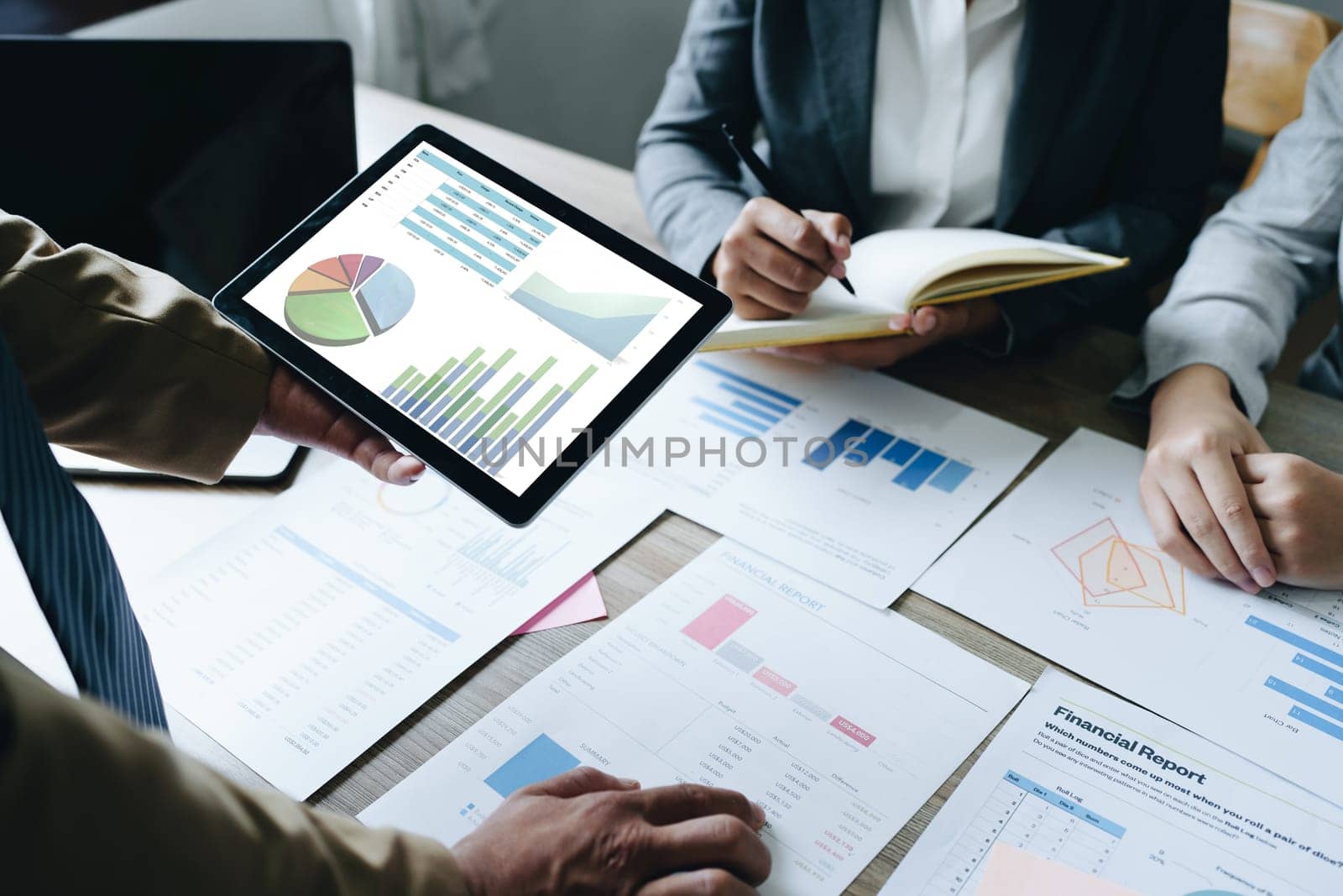 Asian entrepreneurs and business people meeting in a conference room in business planning, financial budget and investment risk assessment to analyze customer groups to increase company growth.