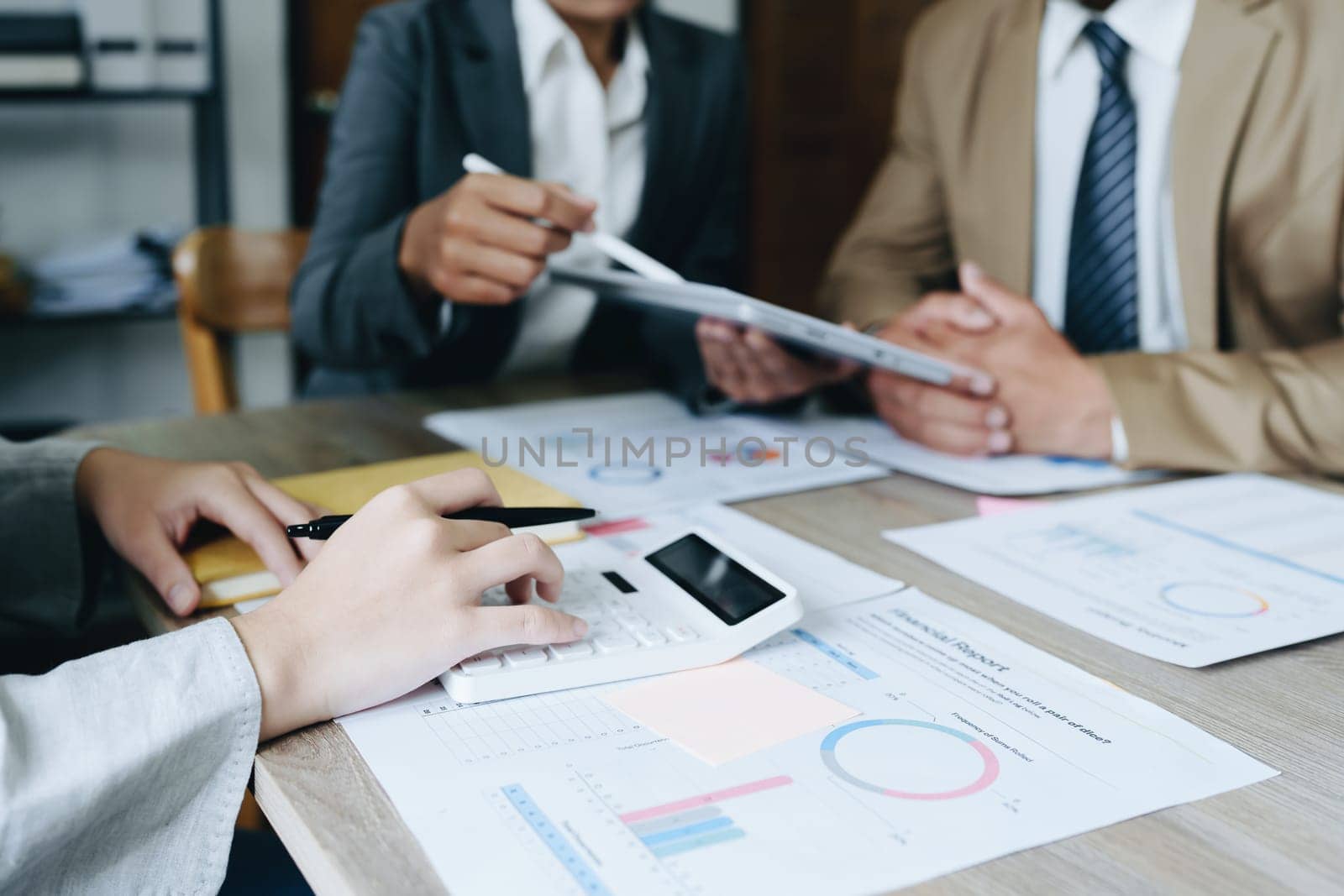 Asian entrepreneurs and business people meeting in a conference room in business planning, financial budget and investment risk assessment to analyze customer groups to increase company growth.