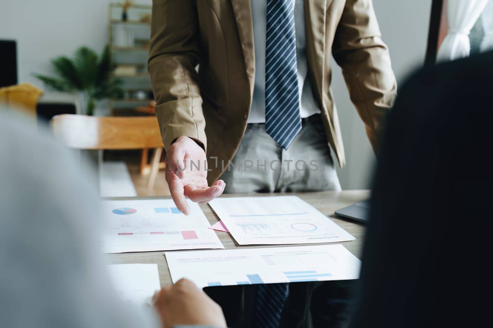 Asian entrepreneurs and business people meeting in a conference room in business planning, financial budget and investment risk assessment to analyze customer groups to increase company growth.