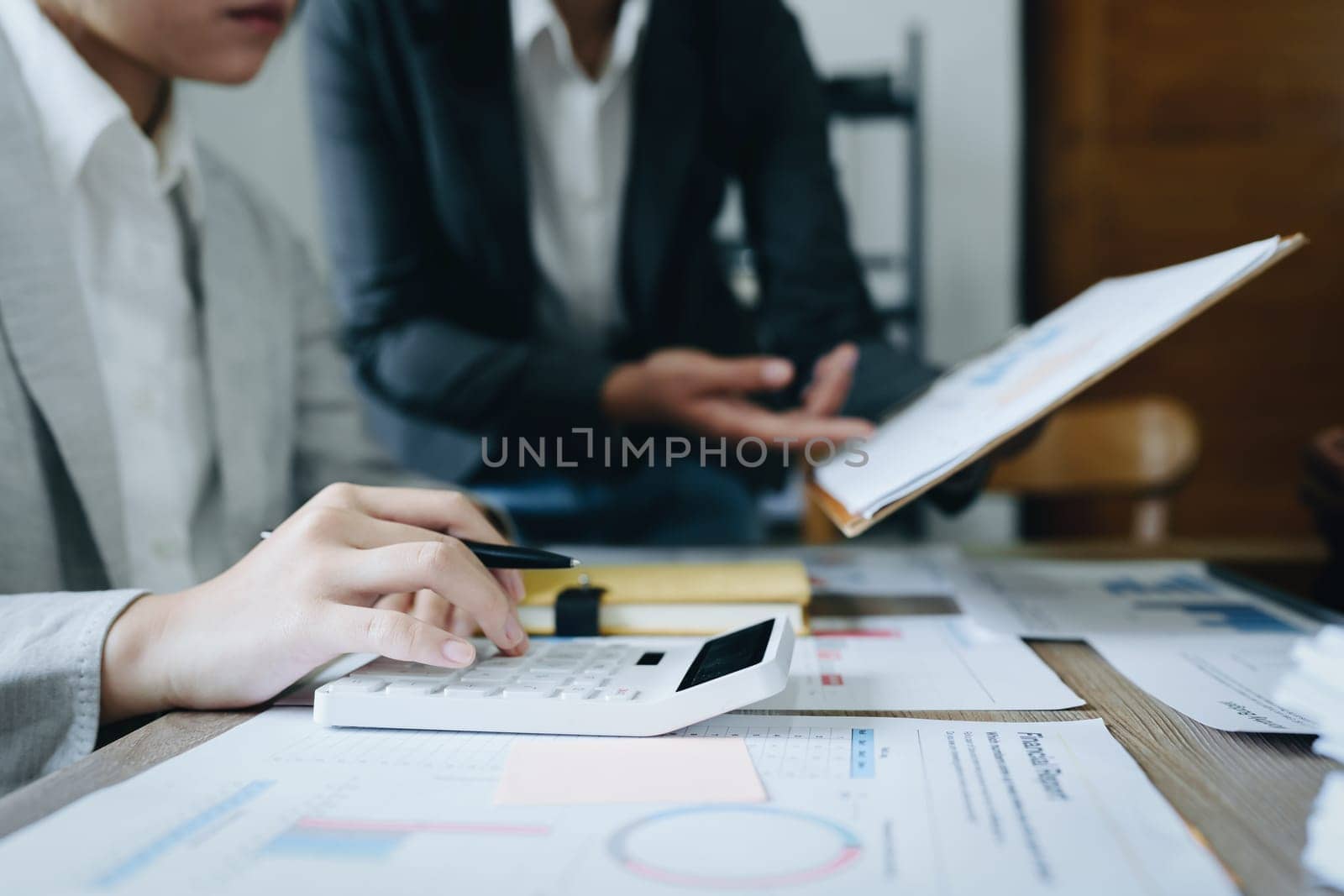 Asian entrepreneurs and business people meeting in a conference room in business planning, financial budget and investment risk assessment to analyze customer groups to increase company growth.