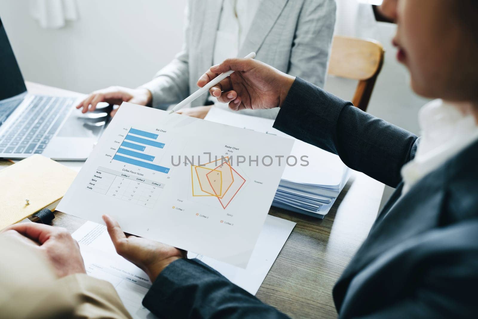 Asian entrepreneurs and business people meeting in a conference room in business planning, financial budget and investment risk assessment to analyze customer groups to increase company growth by Manastrong